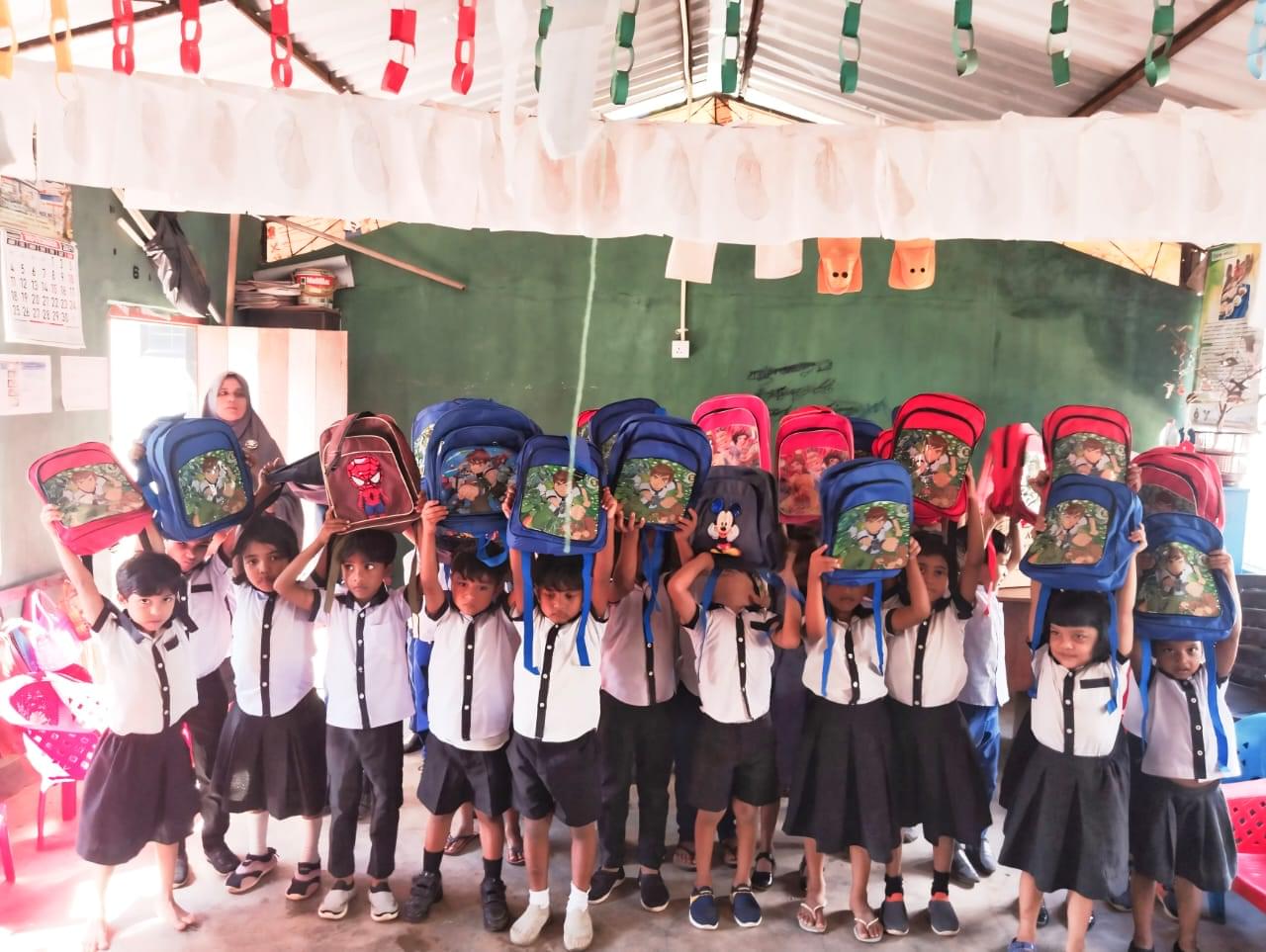 preschool-children got new school bag